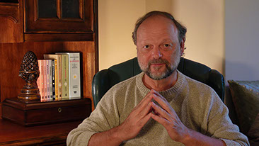 Photo of Martin Janello sitting at his desk, excerpted from the video "The Happiness Principle: Why We Need A Personal Philosophy Of Happiness."